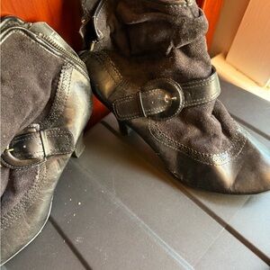 Stylish Black Women's Booties with Heels and Back Zip—slight wear visible